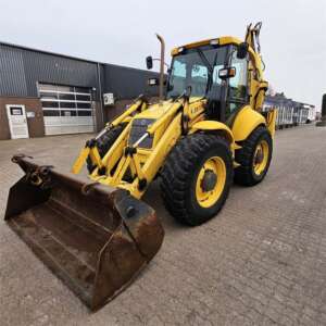 Încărcătoare cu braț cu lopată New Holland LB115, Anul 2000